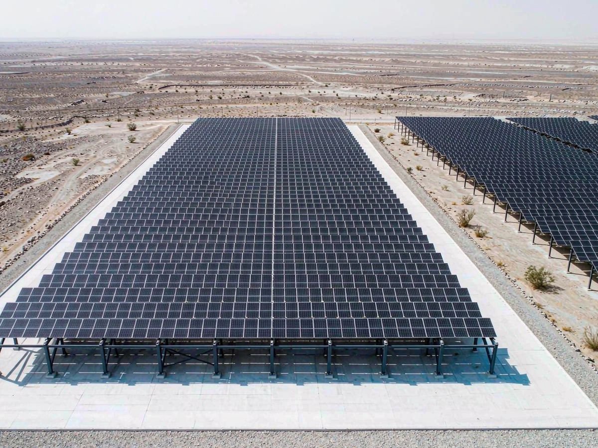Commercial solar array at a desert-edge industrial site in the Middle East