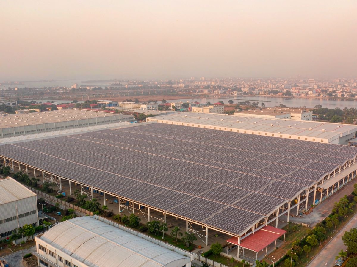Solar system for agro-processing: aerial view of a factory rooftop solar array in Lagos