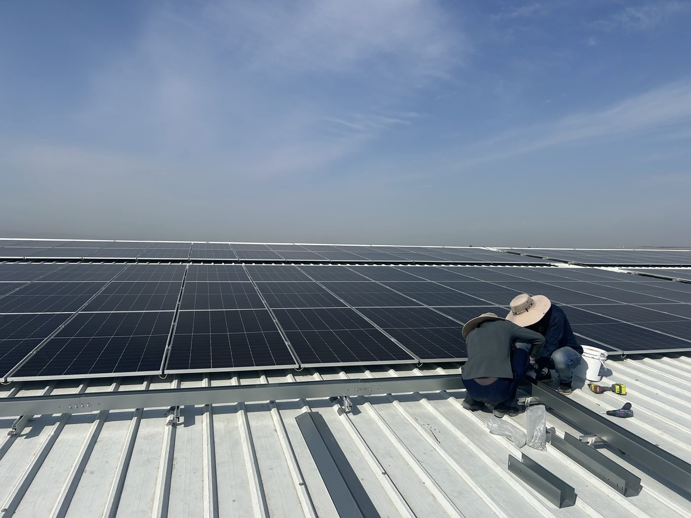 Wide view of the rooftop array of a 1MW solar system for factory in South Africa