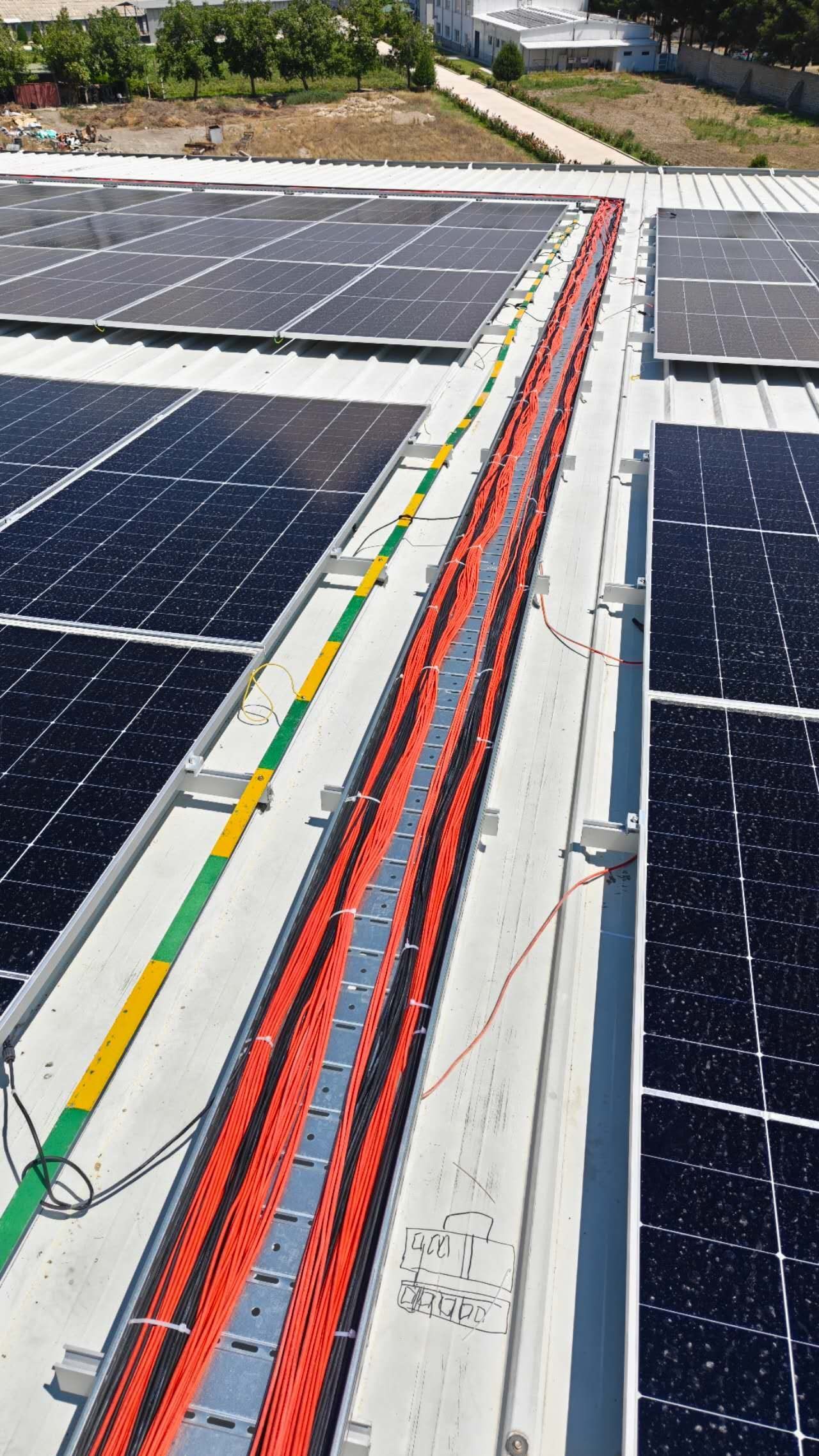 DC cable tray running along the array of a solar system for factory